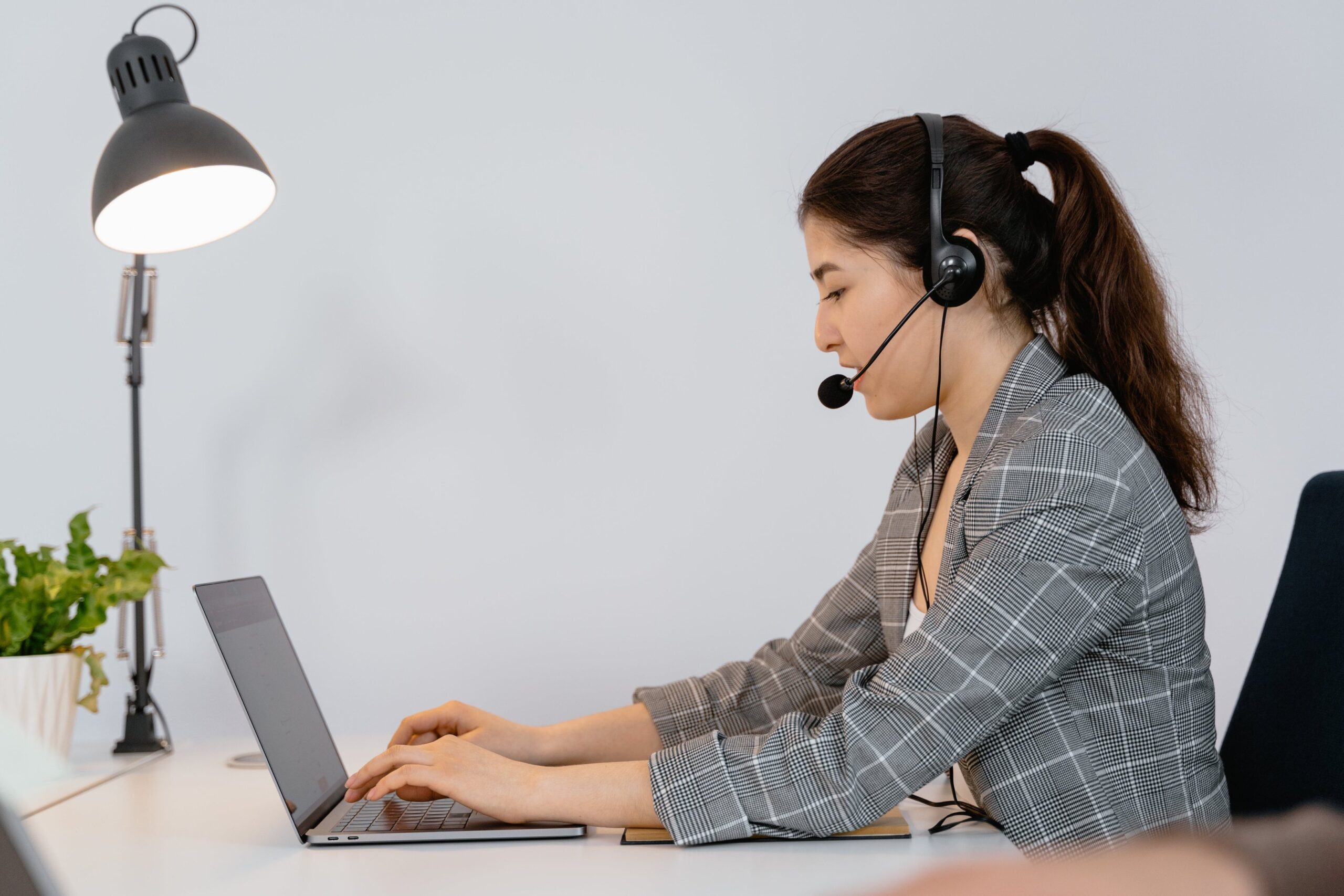 a woman in a headset with a headset and a microphone